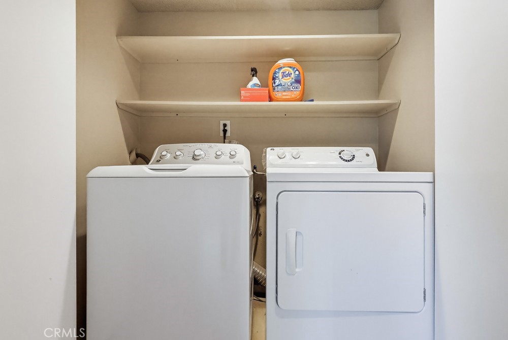 19018 Sherman Way, Unit 110 Reseda, CA 91335 - Photo 51 of 68 a utility room with dryer and washer
