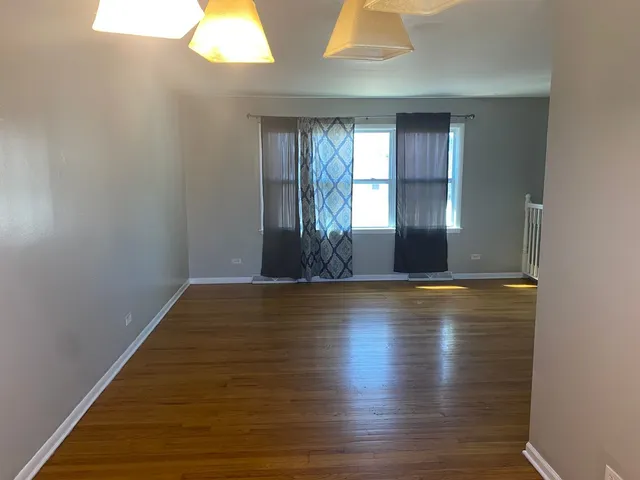 a view of an empty room with window