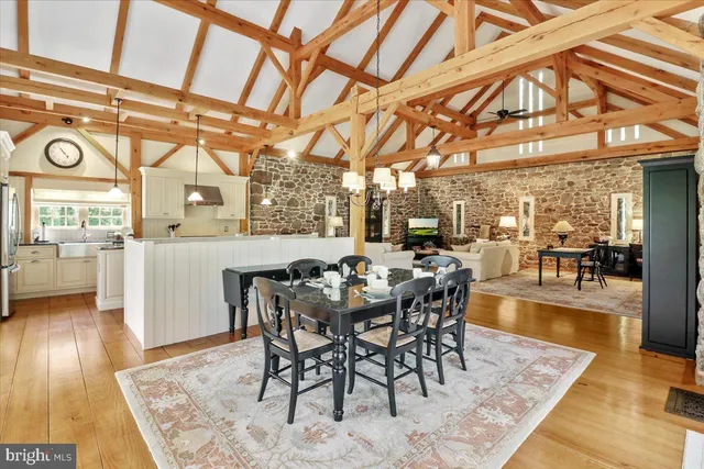 a view of an entryway with wooden floor