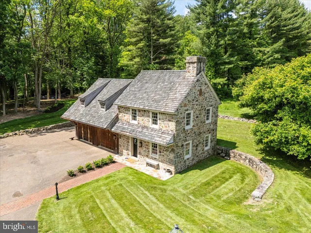 a room with fireplace and windows
