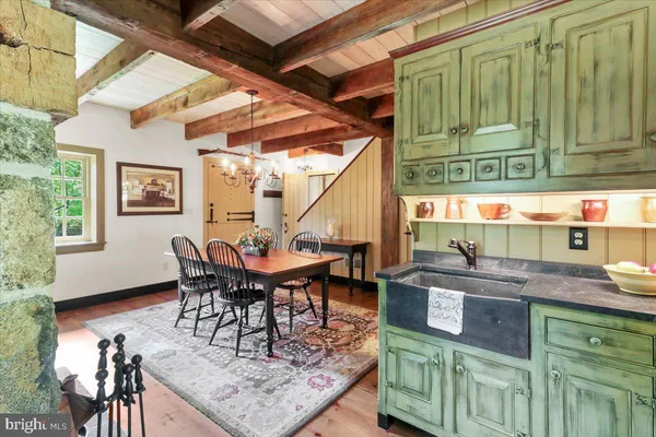 a living room with furniture fireplace and a fireplace