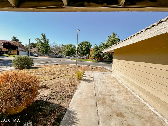 a view of yard with an outdoor space