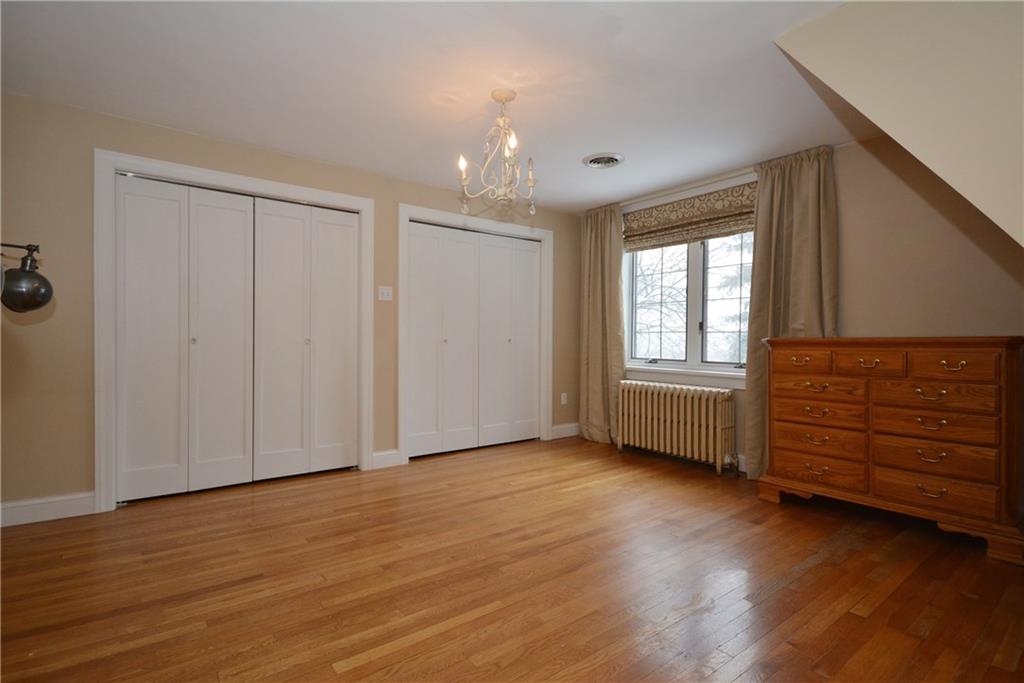 308 Bevington Road Forest Hills, PA 15221 - Photo 13 of 25 Second floor master bedroom includes original hardwoods, two wall mounted light fixtures and custom window treatments. Plenty of closet storage!
