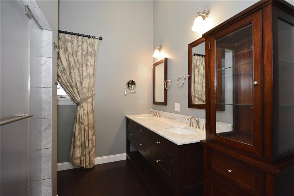 308 Bevington Road Forest Hills, PA 15221 - Photo 15 of 25 Master bathroom is a spa-like retreat! Beatiful cabinetry, dual sink countertop and fixtures. Includes custom window treatments and stunning, state-of-the-art shower.