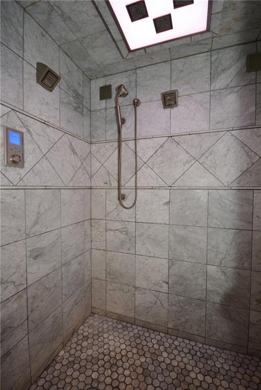 308 Bevington Road Forest Hills, PA 15221 - Photo 16 of 25 Digital controls manage this beautiful shower. Custom tile work, multiple shower jets and direct lighting really make this bathroom a retreat.