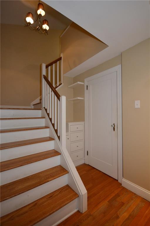 308 Bevington Road Forest Hills, PA 15221 - Photo 17 of 25 Staircase is captured in the master bedroom with custom cabinetry to the right for extra storage, lead up to a private room with loads of storage.