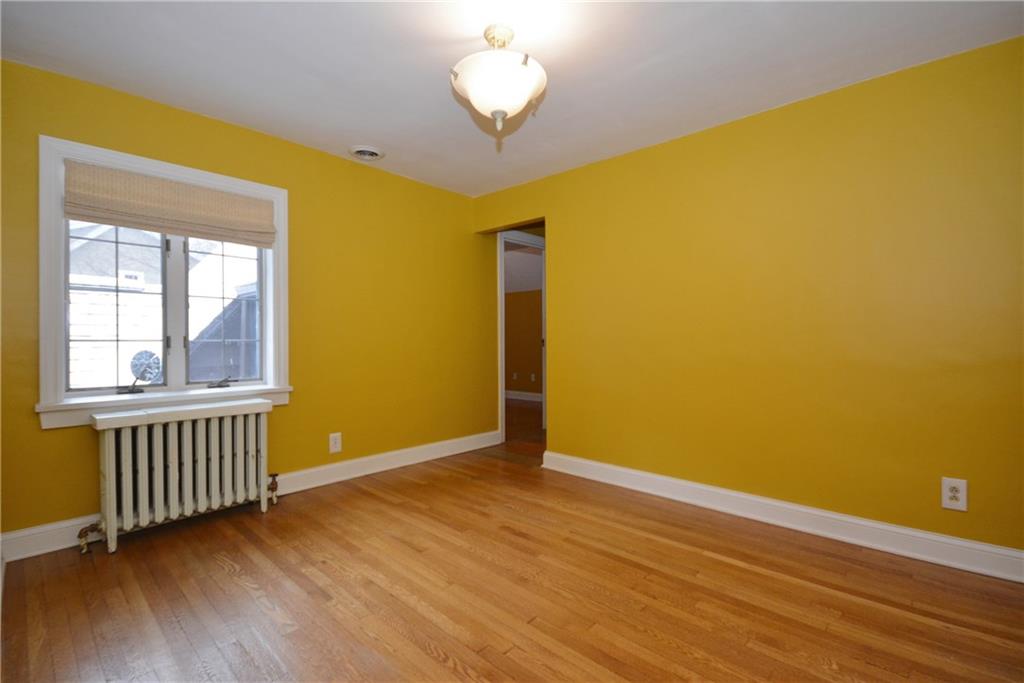 308 Bevington Road Forest Hills, PA 15221 - Photo 20 of 25 Off the second floor landing, there is a common area room with closet, perfect for playroom or office. Entry to the other two bedrooms is seen ahead.