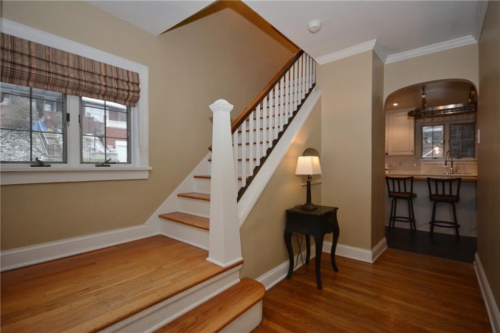 308 Bevington Road Forest Hills, PA 15221 - Photo 3 of 25 Entry hallway. Powder room on the landing to the left, stairs to second floor, entry to kitchen straight ahead and living room to the right
