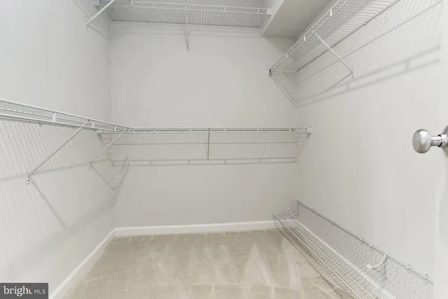 a view of a room with racks on the wall