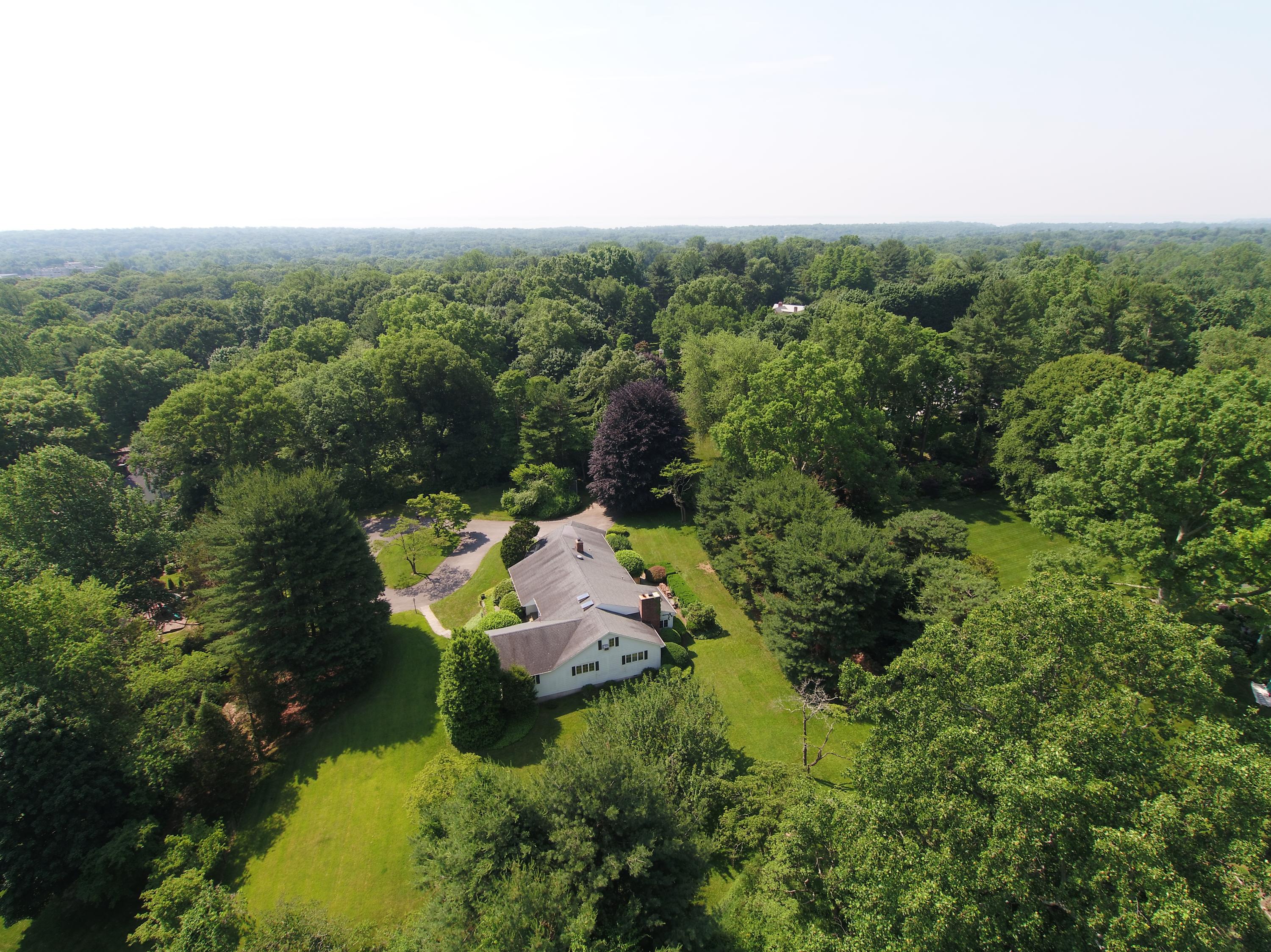 65 Maywood Road Darien, CT 06820 - Photo 11 of 14 a aerial view of a house with a yard