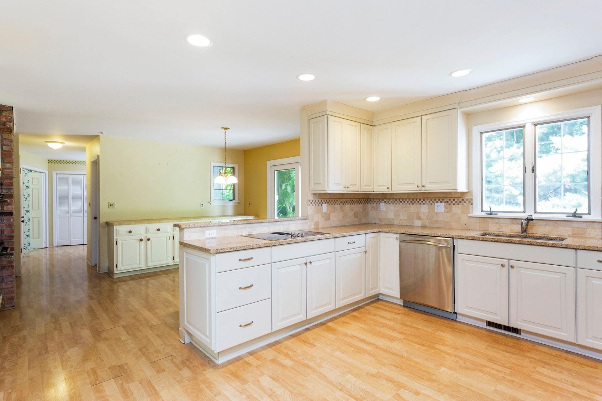 65 Maywood Road Darien, CT 06820 - Photo 6 of 14 a kitchen with granite countertop a sink and cabinets