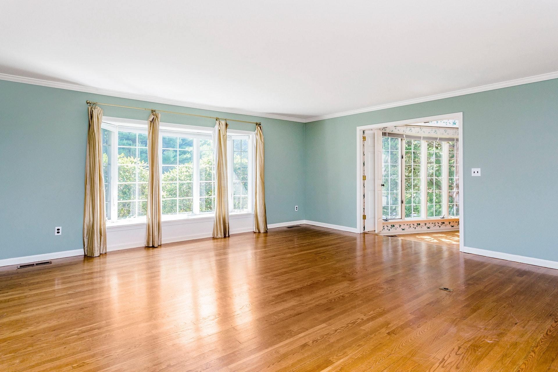 65 Maywood Road Darien, CT 06820 - Photo 9 of 14 a view of an empty room with wooden floor and a window
