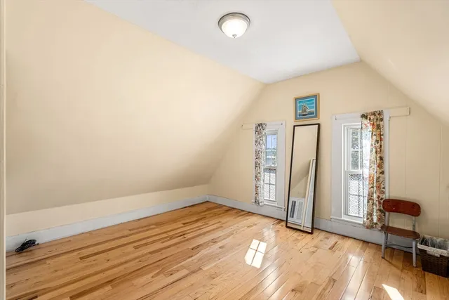 a view of a livingroom with furniture and wooden floor