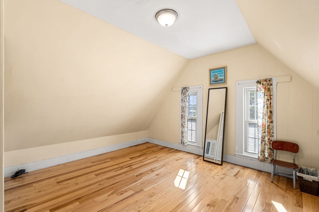 33 Middle Street Gloucester, MA 01930 - Photo 31 of 42 a view of an empty room with glass door