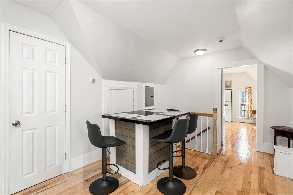 33 Middle Street Gloucester, MA 01930 - Photo 32 of 42 a view of a livingroom with furniture and wooden floor