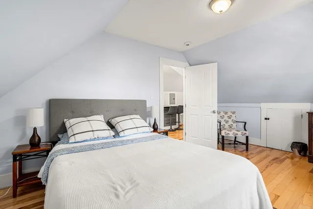 a spacious bathroom with a double vanity sink a and a shower