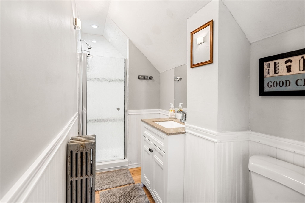 33 Middle Street Gloucester, MA 01930 - Photo 39 of 42 a spacious bathroom with a double vanity sink a and a shower