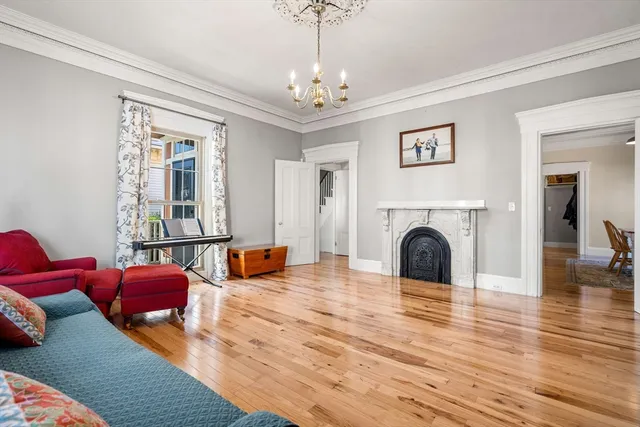 a bedroom with a bed and a table in it