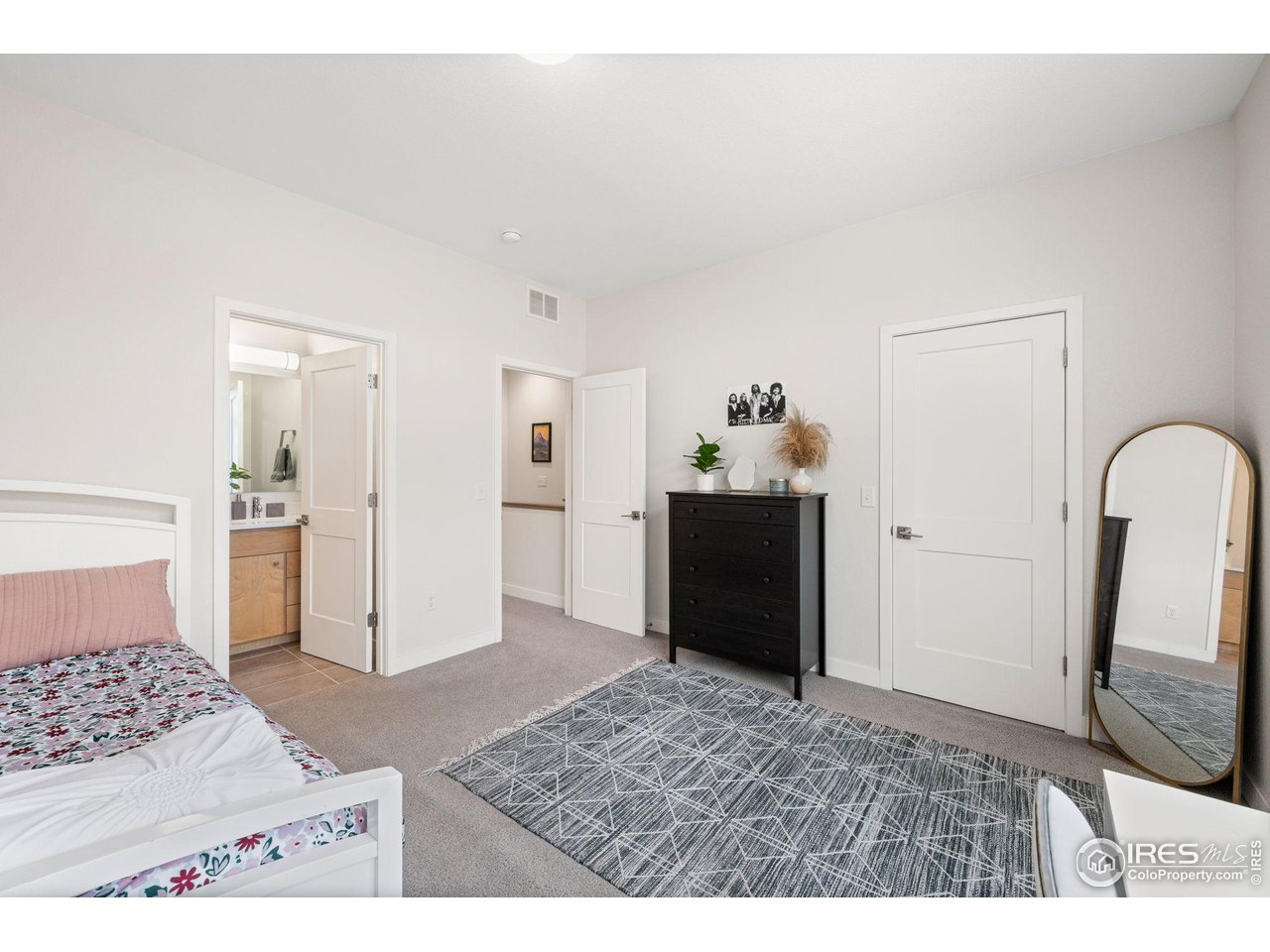 400 West Baseline Road, Unit B Lafayette, CO 80026 - Photo 14 of 36 Secondary bedroom with en suite full bath