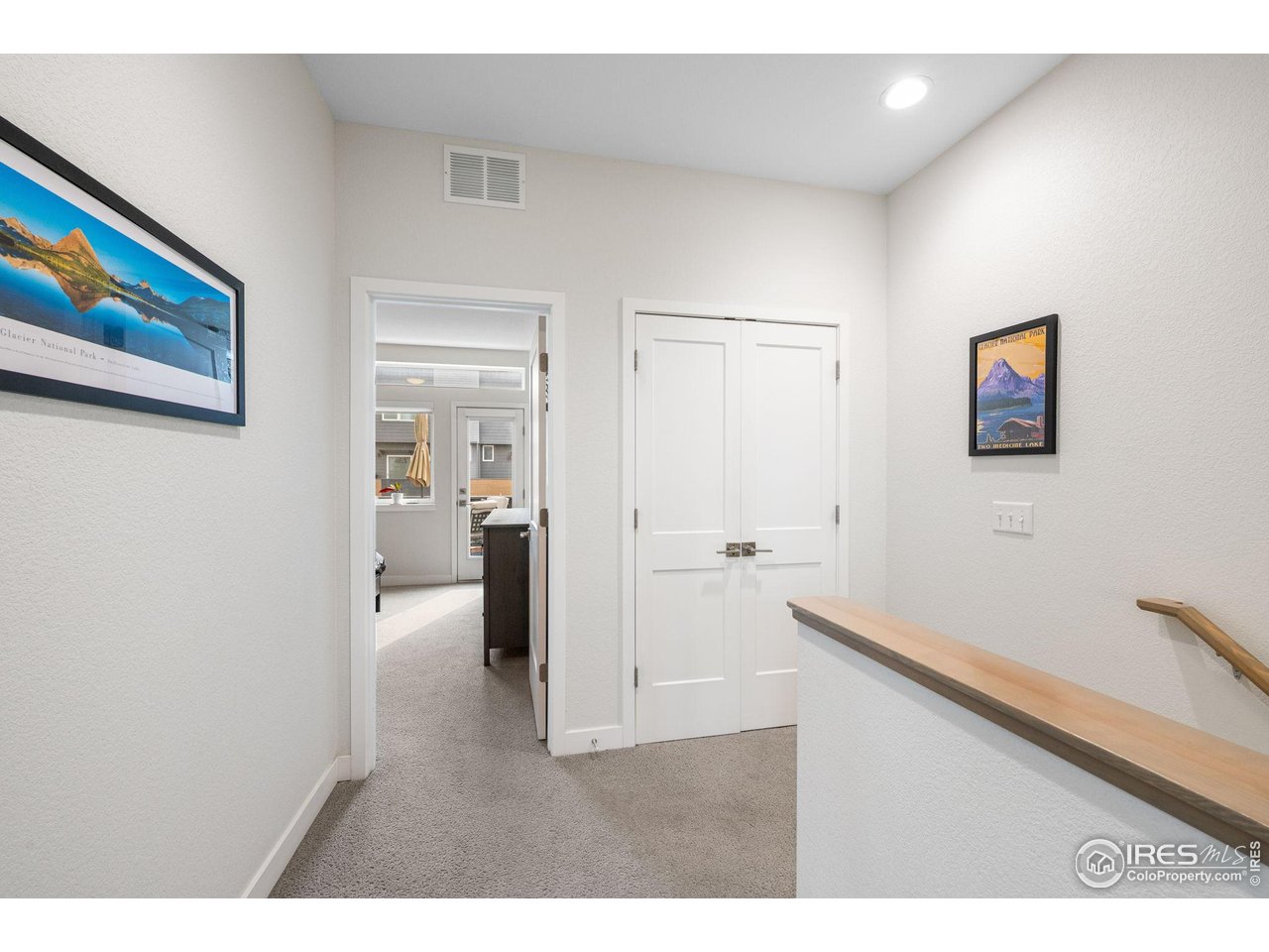 400 West Baseline Road, Unit B Lafayette, CO 80026 - Photo 15 of 36 Hallway + laundry closet with view of primary suite