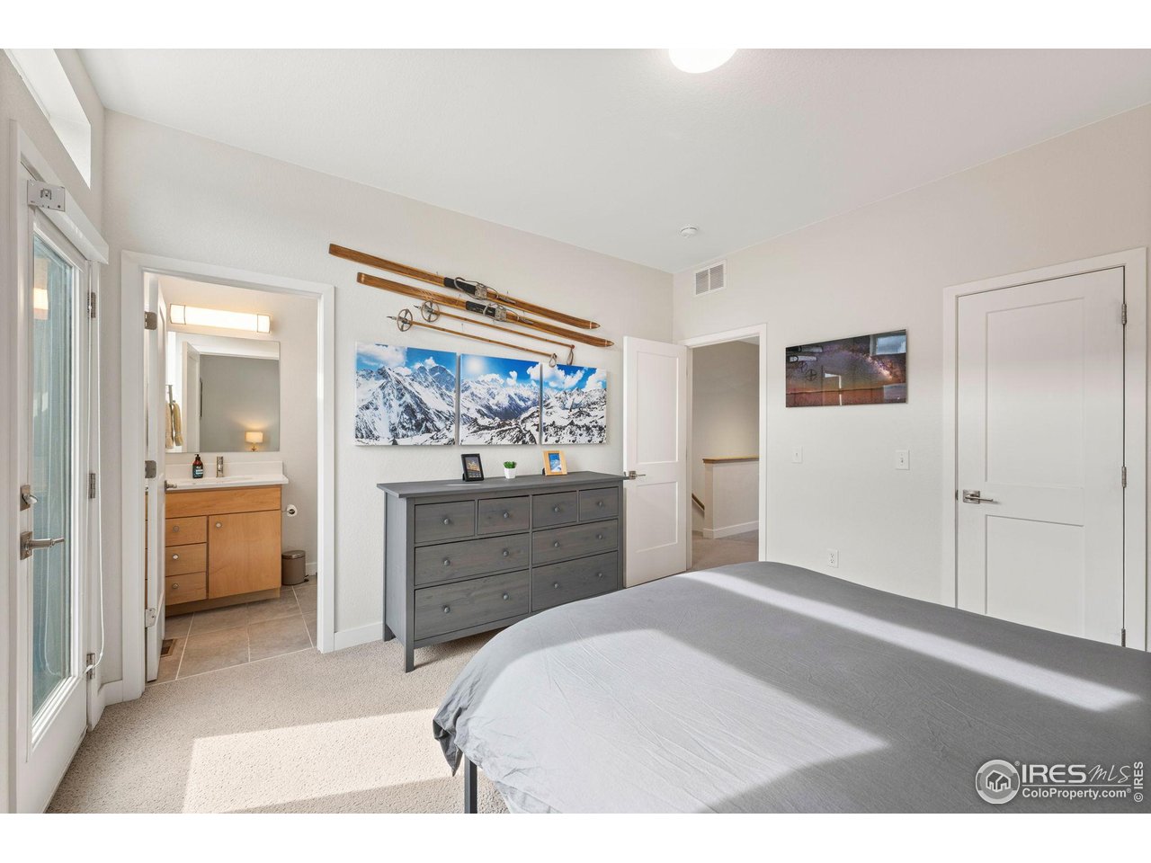 400 West Baseline Road, Unit B Lafayette, CO 80026 - Photo 10 of 36 Primary bedroom with en suite full bath