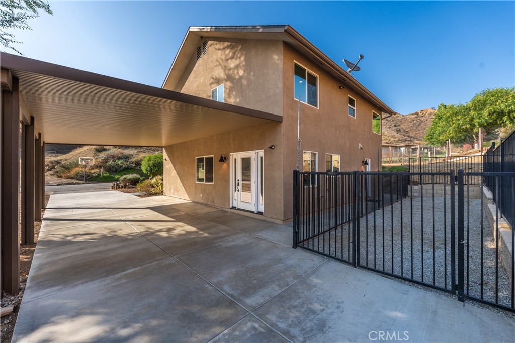 30300 Live Oak Canyon Road Redlands, CA 92373 - Photo 13 of 67 a view of a house with a balcony