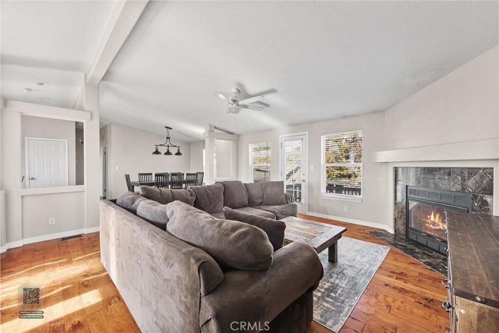990 Mesa Valley Road Lebec, CA 93243 - Photo 14 of 38 a living room with furniture and a fireplace