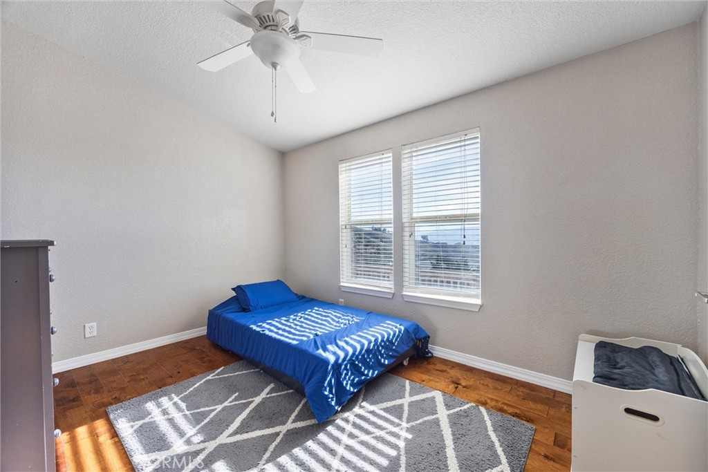 990 Mesa Valley Road Lebec, CA 93243 - Photo 23 of 38 a bedroom with a bed and window