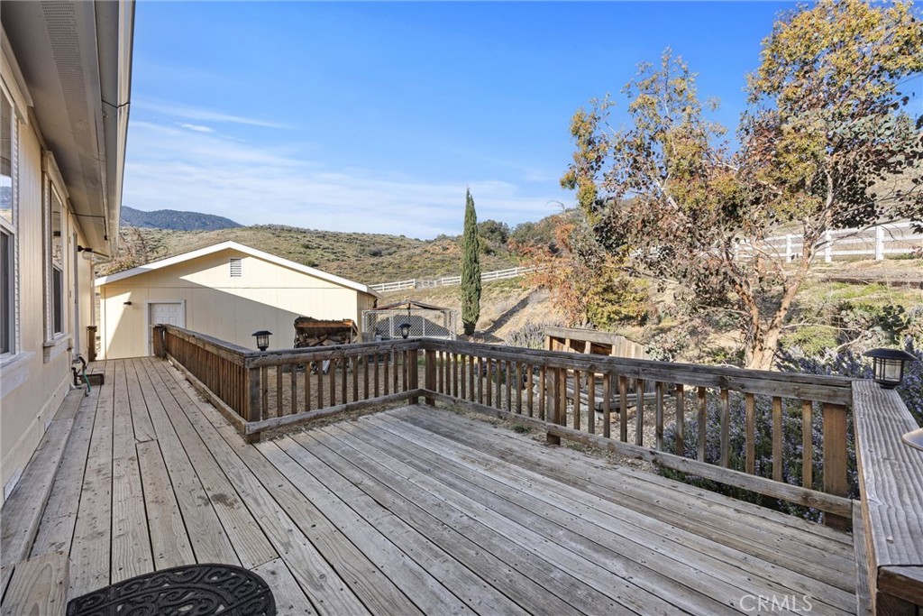 990 Mesa Valley Road Lebec, CA 93243 - Photo 29 of 38 a view of balcony with wooden floor and fence