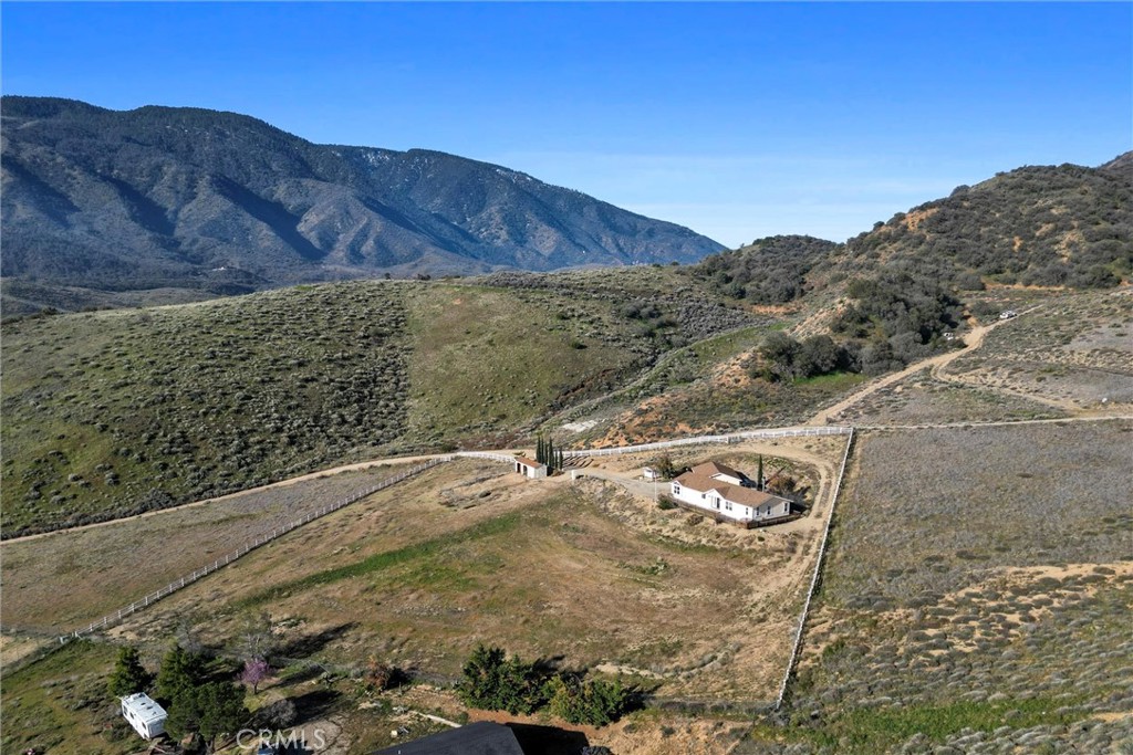 990 Mesa Valley Road Lebec, CA 93243 - Photo 3 of 38 a view of a backyard with wooden fence