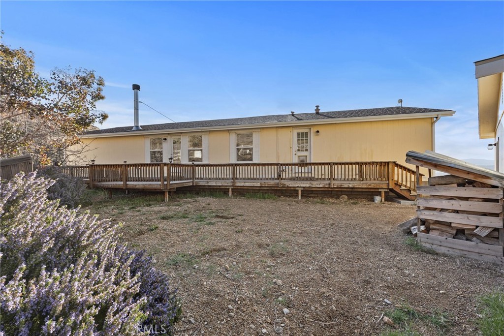 990 Mesa Valley Road Lebec, CA 93243 - Photo 31 of 38 a view of a house with a backyard