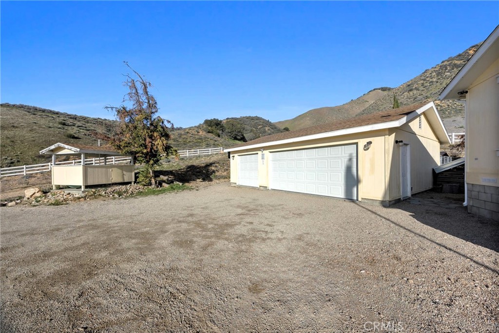 990 Mesa Valley Road Lebec, CA 93243 - Photo 35 of 38 a view of a house with a snow in the background