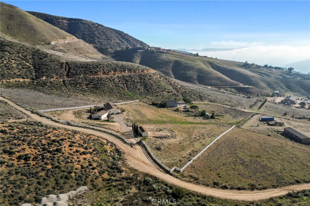 990 Mesa Valley Road Lebec, CA 93243 - Photo 4 of 38 a view of a swimming pool with a yard