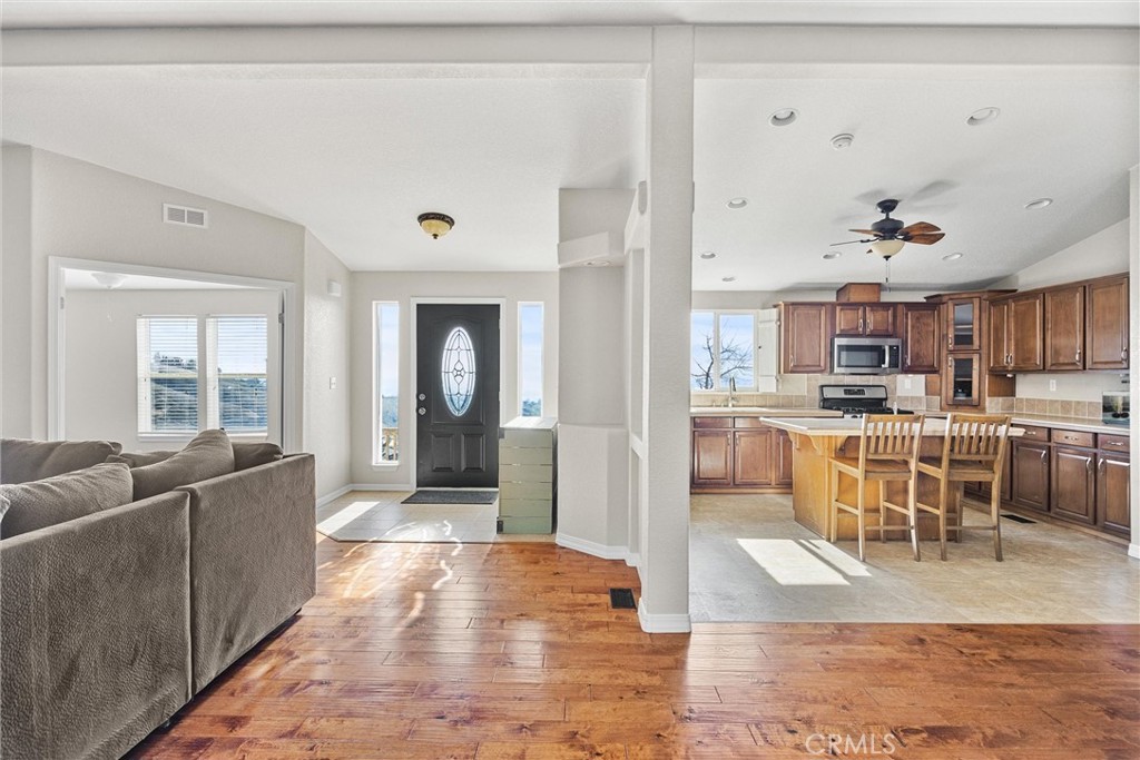 990 Mesa Valley Road Lebec, CA 93243 - Photo 7 of 38 a living room with furniture and a view of kitchen