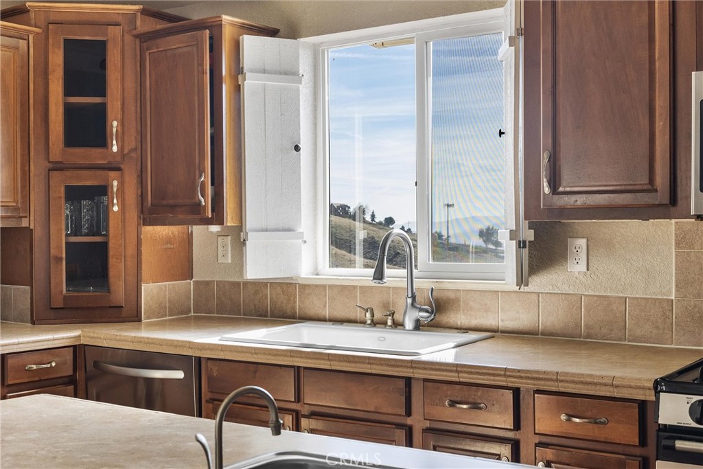 990 Mesa Valley Road Lebec, CA 93243 - Photo 10 of 38 a kitchen with a sink and a window
