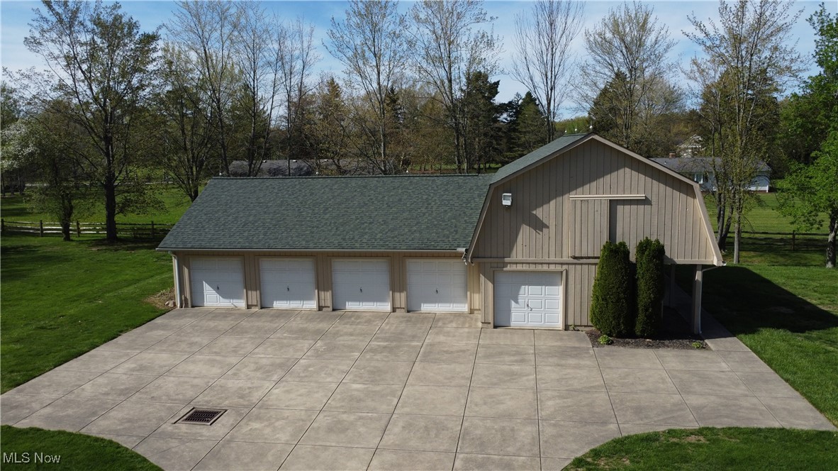 9870 Hobart Road Willoughby, OH 44094 - Photo 50 of 50 Detached garage with fence and visible vents