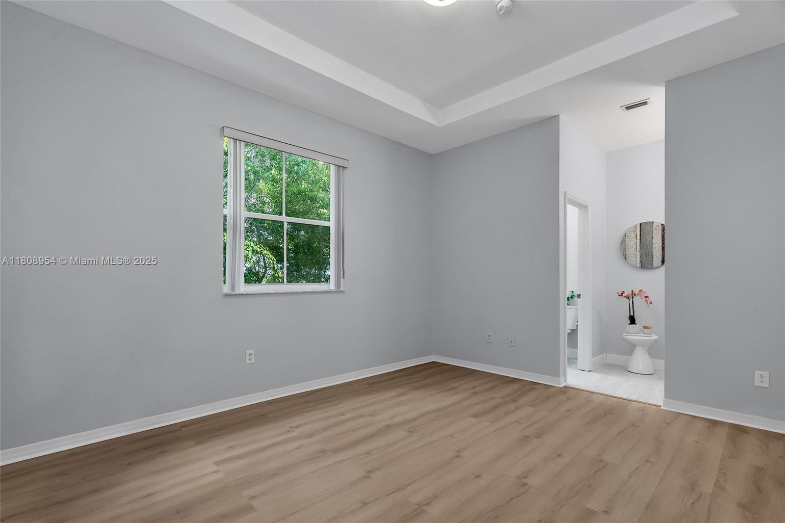 14059 Southwest 49th Street, Unit 4 Miramar, FL 33027 - Photo 15 of 29 wooden floor in an empty room