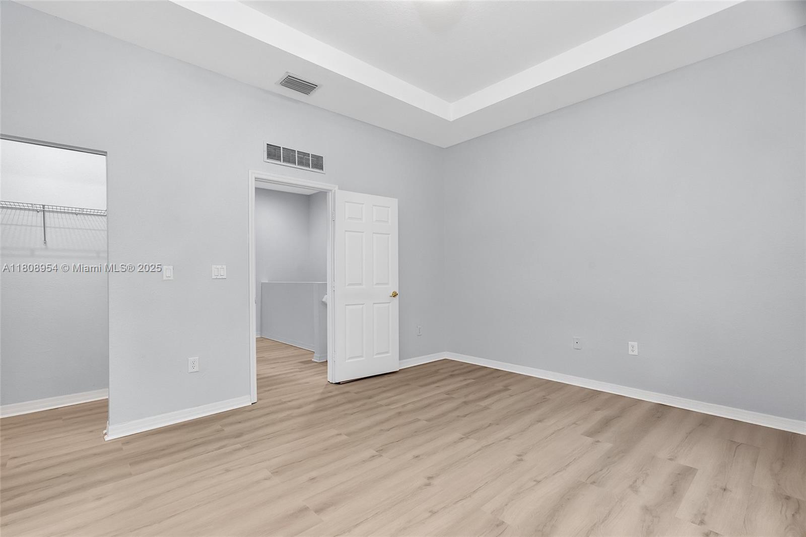 14059 Southwest 49th Street, Unit 4 Miramar, FL 33027 - Photo 17 of 29 wooden floor in an empty room