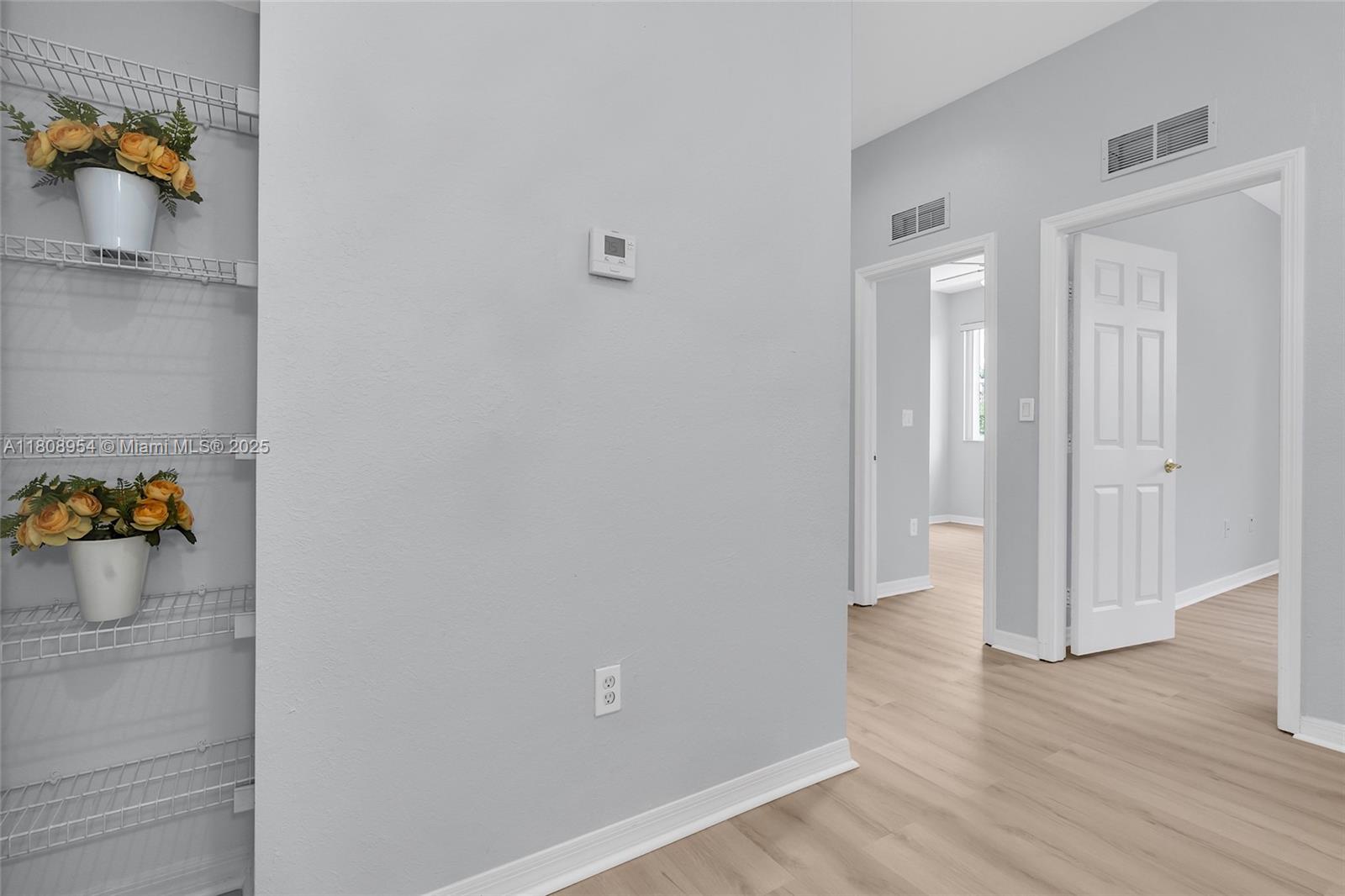 14059 Southwest 49th Street, Unit 4 Miramar, FL 33027 - Photo 20 of 29 wooden floor in a room