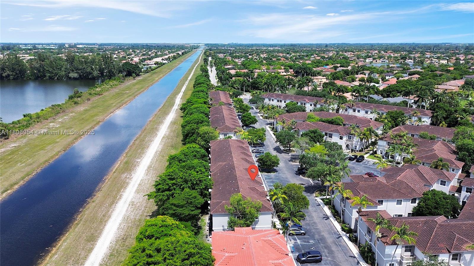 14059 Southwest 49th Street, Unit 4 Miramar, FL 33027 - Photo 24 of 29 an aerial view of house with yard space and lake view