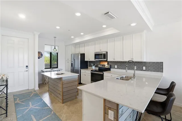 $440,000 | 9578 Trevi Court, Unit 5124, Naples, FL 34113