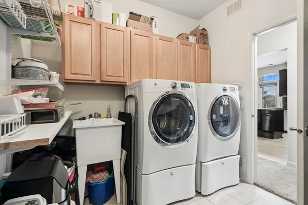 a utility room with dryer and washer