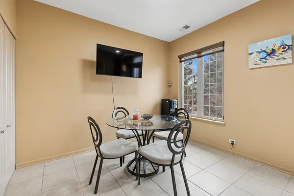 a view of a livingroom with furniture and a flat screen tv