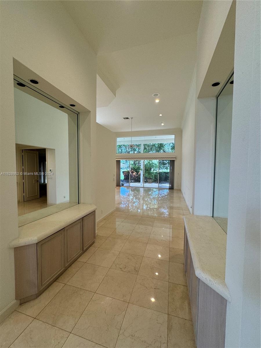 2743 Pinehurst Drive Weston, FL 33332 - Photo 13 of 35 a view of a kitchen with a sink and a large window
