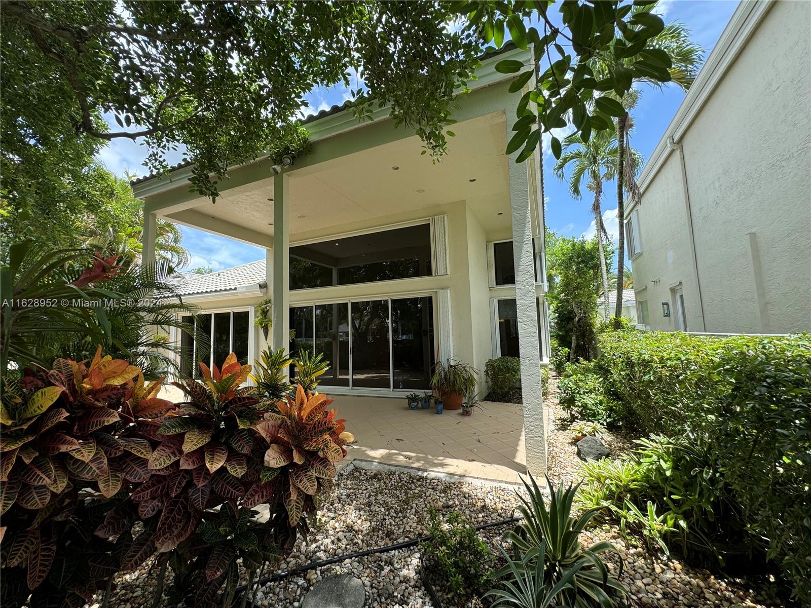 2743 Pinehurst Drive Weston, FL 33332 - Photo 27 of 35 a view of a house with patio