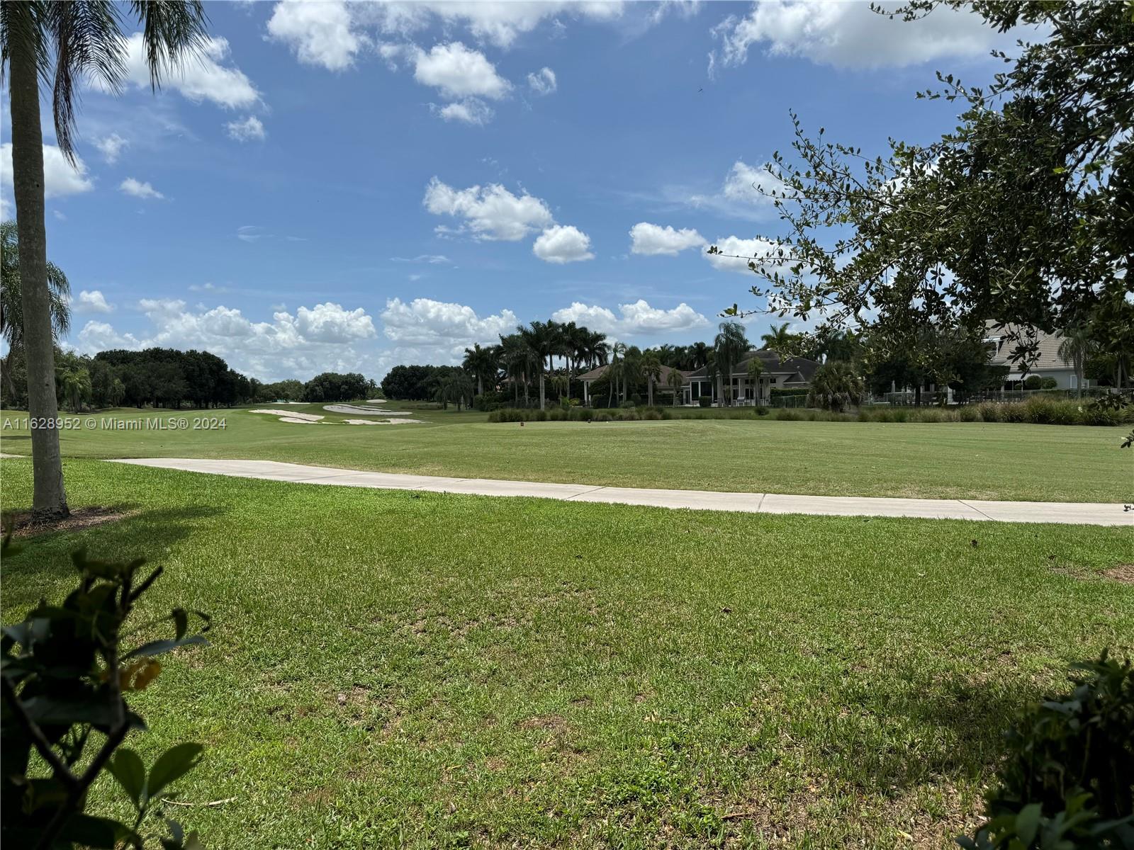 2743 Pinehurst Drive Weston, FL 33332 - Photo 33 of 35 a view of a golf course with a lake