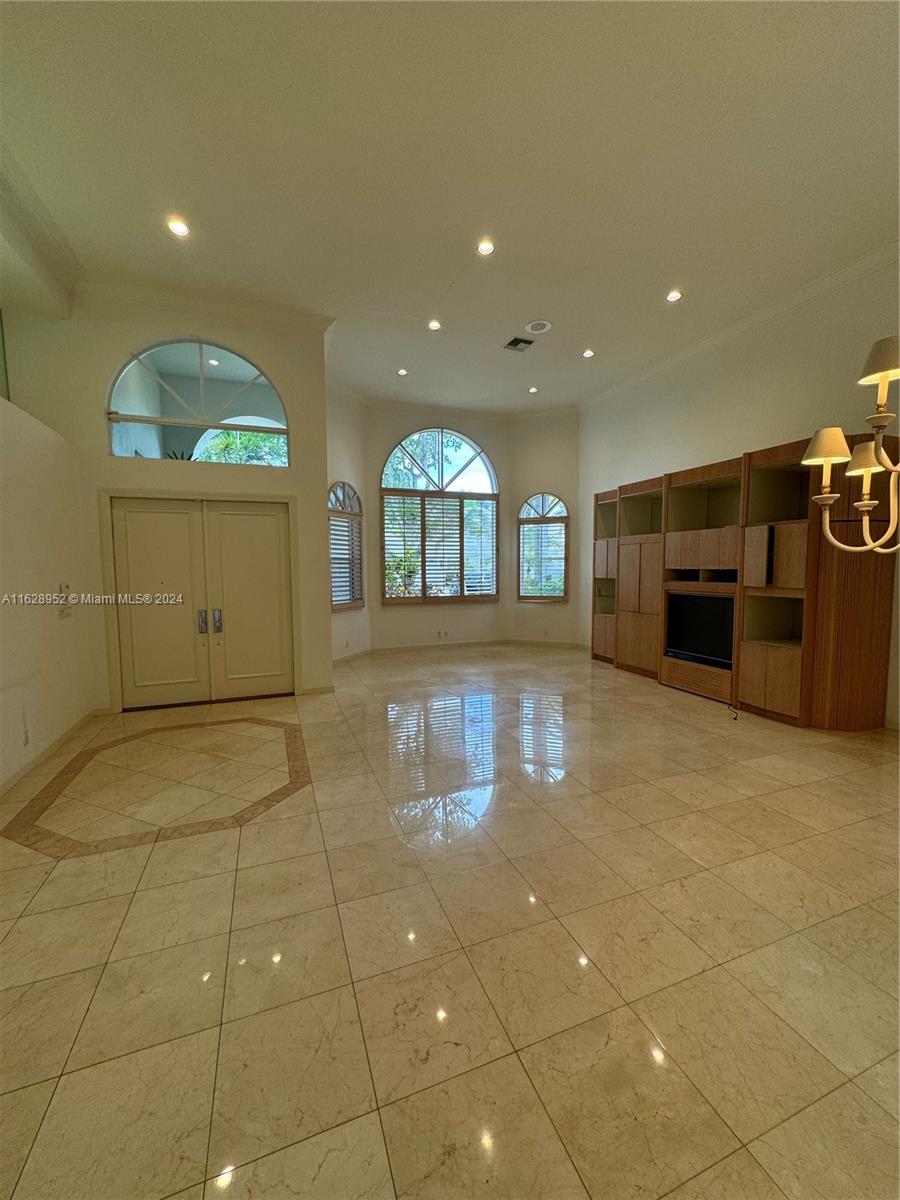 2743 Pinehurst Drive Weston, FL 33332 - Photo 5 of 35 a room with lots of counter and window