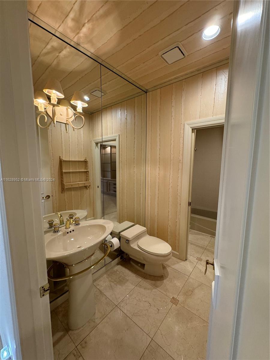 2743 Pinehurst Drive Weston, FL 33332 - Photo 7 of 35 a bathroom with a sink vanity toilet and shower