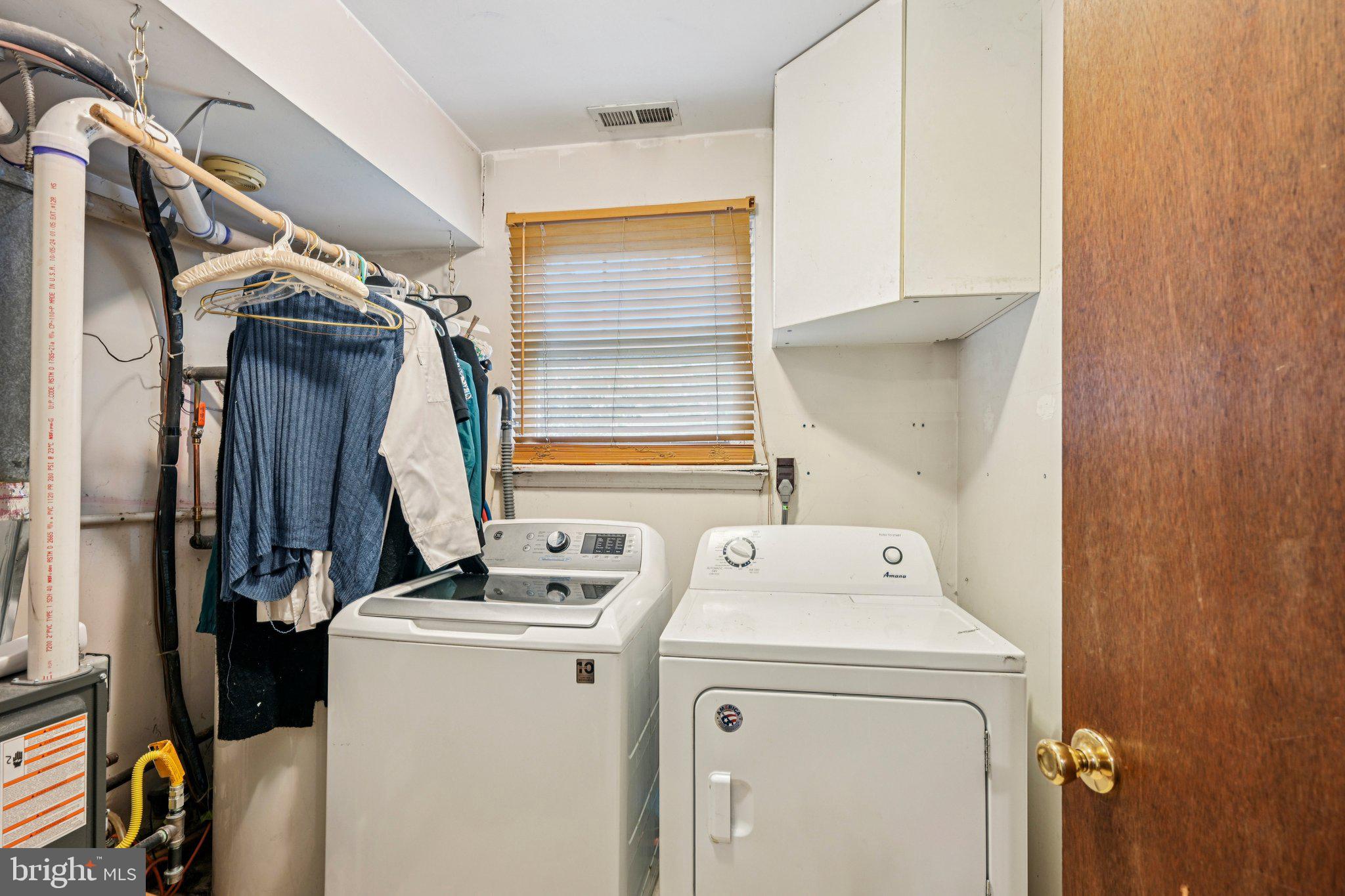 13 Tarnsfield Road Westampton, NJ 08060 - Photo 21 of 44 a view of storage and utility room with washer and dryer