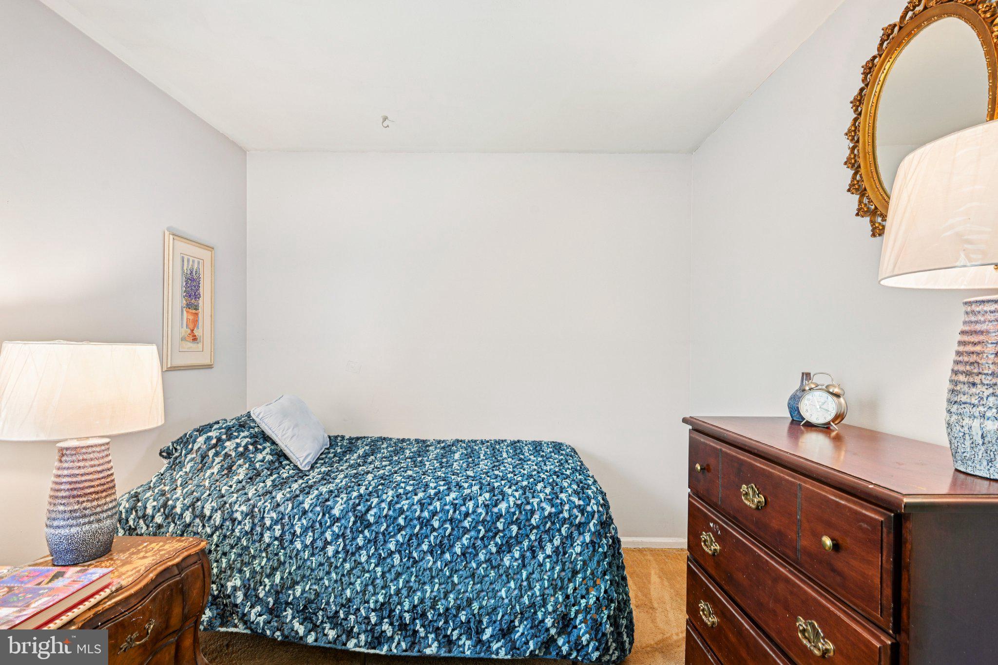 13 Tarnsfield Road Westampton, NJ 08060 - Photo 25 of 44 a bedroom with a bed and a lamp on dresser